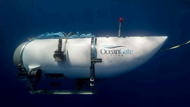 FILE PHOTO: The Titan submersible, operated by OceanGate Expeditions to explore the wreckage of the sunken SS Titanic off the coast of Newfoundland, dives in an undated photograph.  OceanGate Expeditions/Handout via REUTERS/File Photo